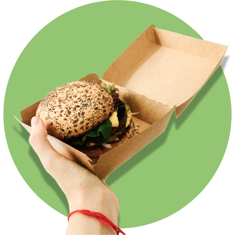 handing out a hamburger